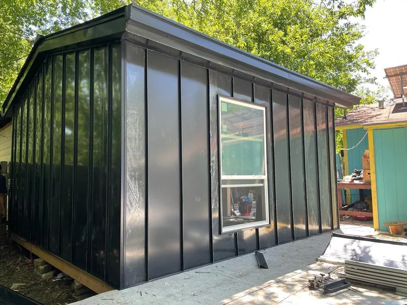 Black standing seam metal wall panels for Metal Roof Installation in Sachse