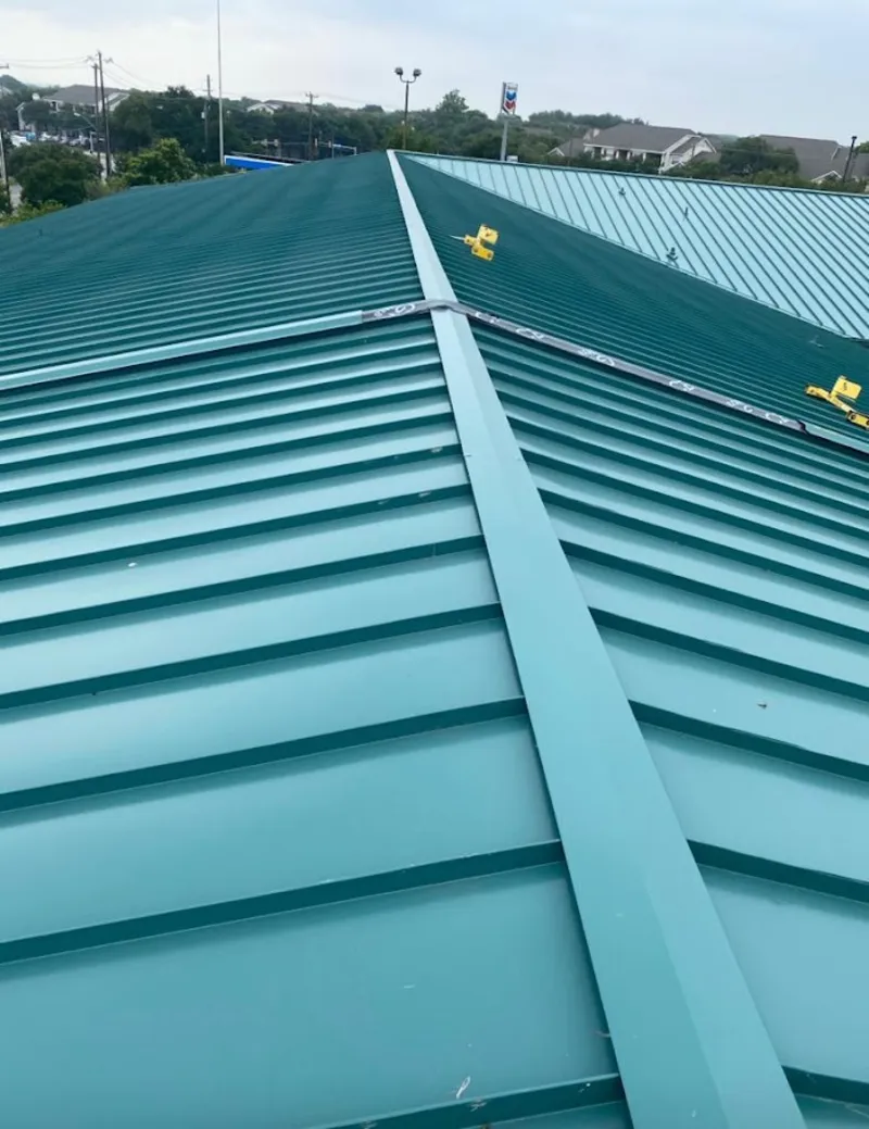 Green commercial metal roof ridge and valley for Metal Roof Repair in Sachse