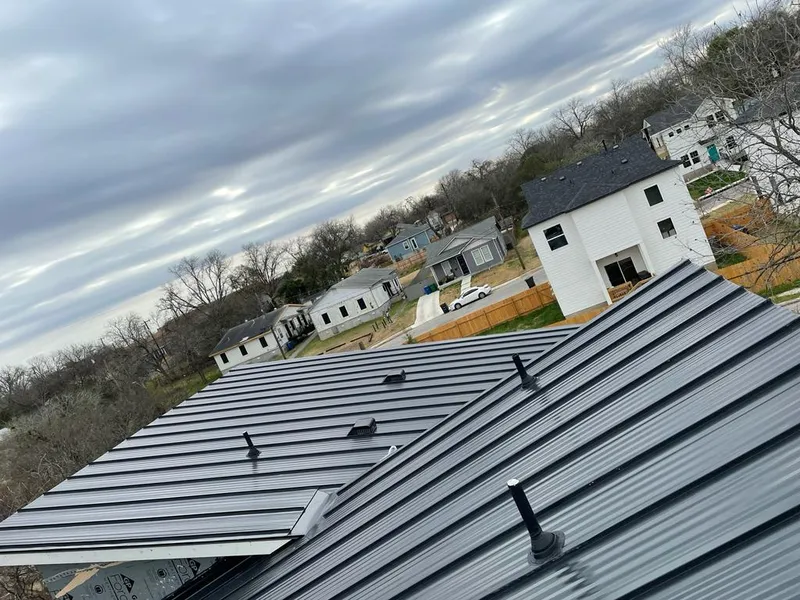 Standing seam metal roof panels with vents for Skylight Repair in Sachse